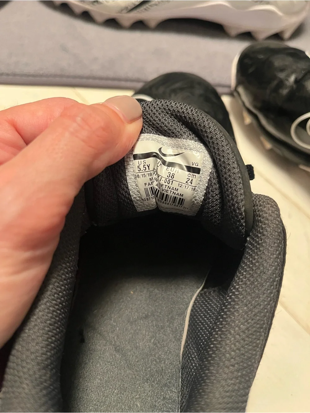 Nike Kids Black Sneakers with White Swoosh